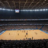 Ginásio de esportes em Campinas durante final de vôlei, quadra iluminada e bola sobre a rede